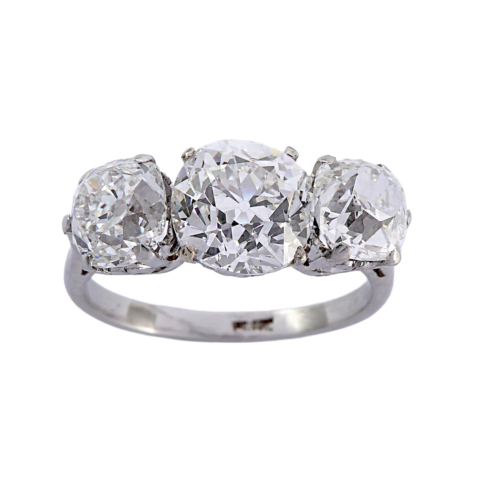 Three stone graduated old cushion cut diamond ring, the old mine cut diamonds of 2.02ct G SI, 1.09ct F SI1 and 1.02ct G VS2,